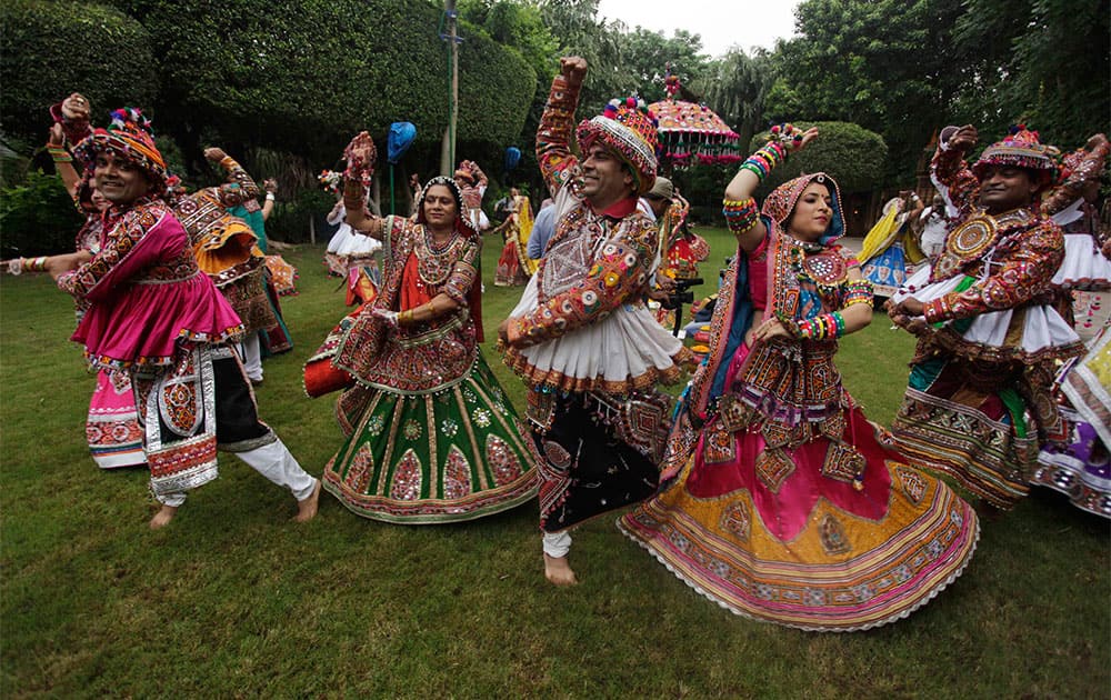 Indians dressed in traditional finery practice the Garba dance ahead of the Navratri festival in Ahmadabad.