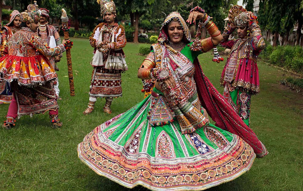 Indians dressed in traditional finery practice the Garba dance ahead of the Navratri festival in Ahmadabad.