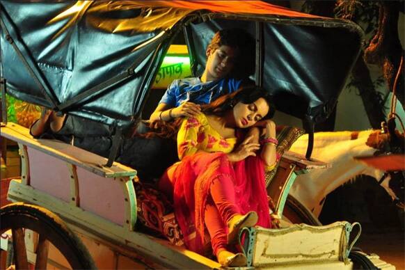 Kangana Ranaut resting on the shoulder of her partner in this still from 'Rajjo'.