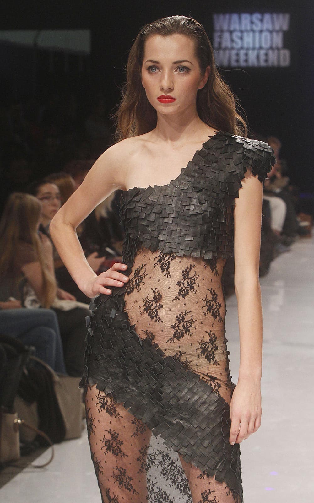 A model presents a creation during a young Polish designer's show on the second day of Warsaw Fashion Weekend in Warsaw, Poland.