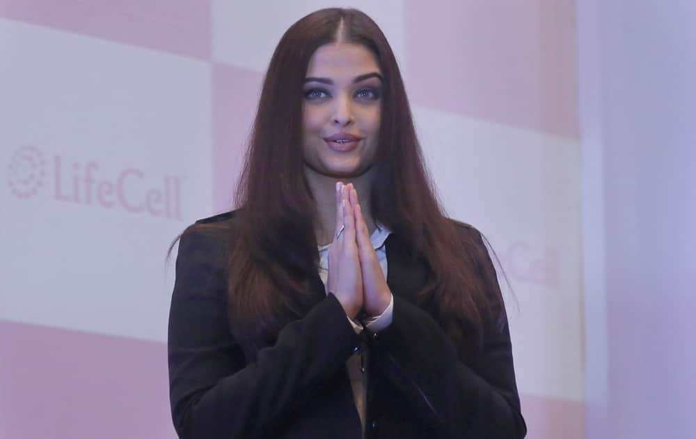 Bollywood actress Aishwaraya Rai Bachchan greets the media at a press conference of private stem cell bank LifeCell in Mumbai.