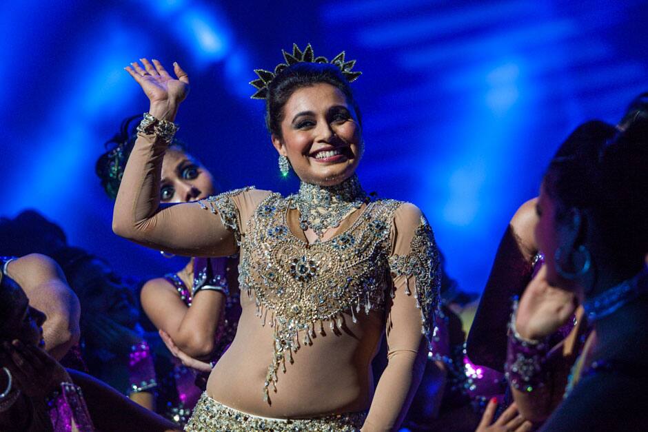 Rani Mukerji waves at the crowd during her performance.