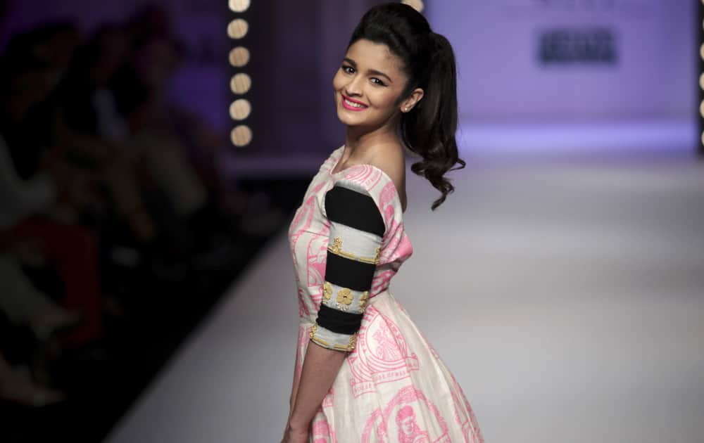 Alia Bhatt displays a creation by Masaba during the Wills Lifestyle India Fashion Week in New Delhi.