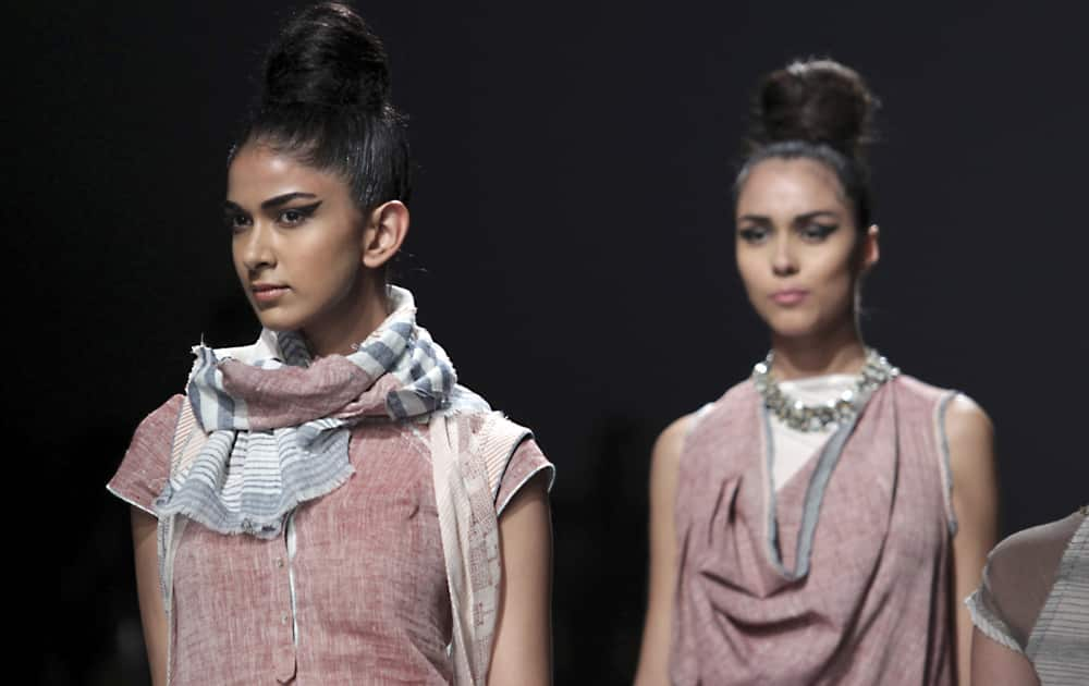 Models display creations by Urvashi Kaur during the Wills lifestyle Fashion Week in New Delhi.