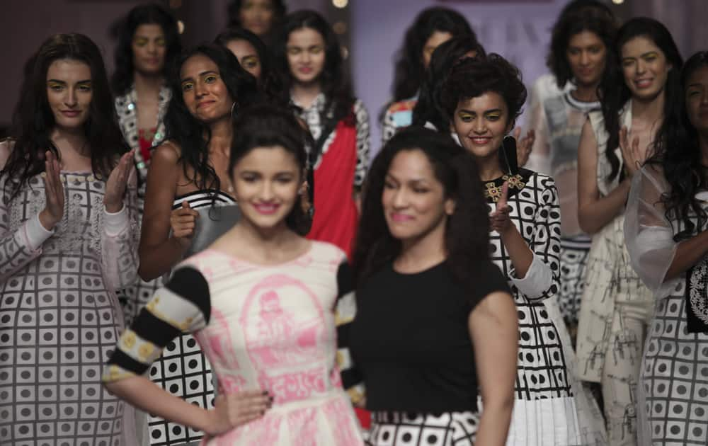 Models display creations by Masaba during the Wills Lifestyle India Fashion Week in New Delhi.