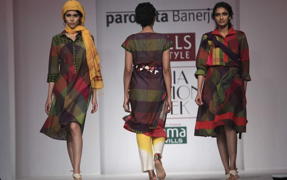 Models display creations by Paromita Banerjee during the Wills lifestyle Fashion Week in New Delhi.