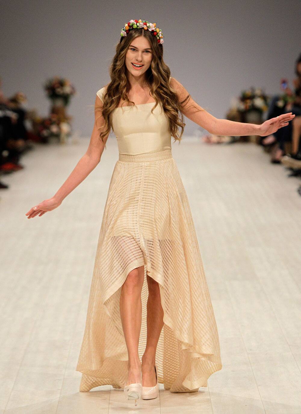 A model displays an outfit by Ukrainian designer Elena Burba during Ukraine Fashion Week.