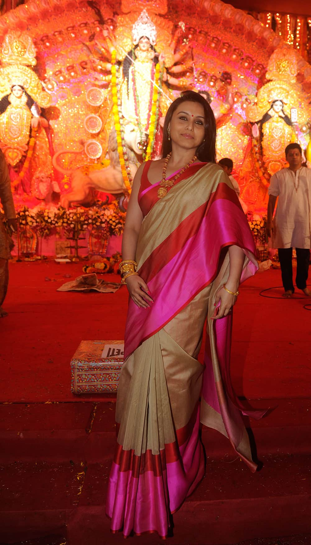 Dressed in a simple sari Rani Mukerji along with her parents attended the Durga Puja at Tulip Star Juhu..Pic Courtesy: DNA