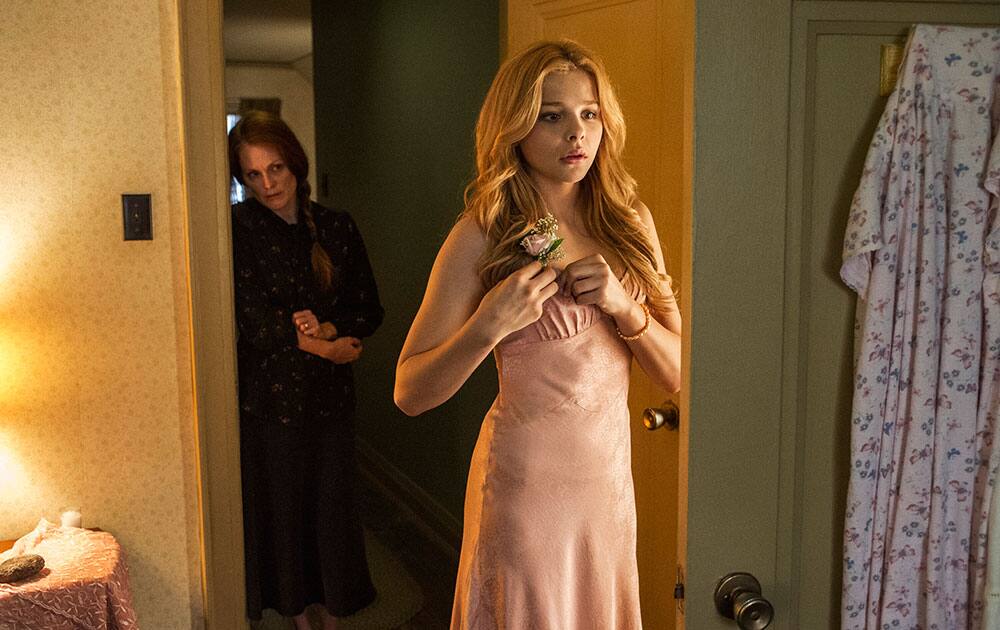 This photo released by Sony Pictures shows Julianne Moore, left, and Chloe Moretz, in a scene from, 