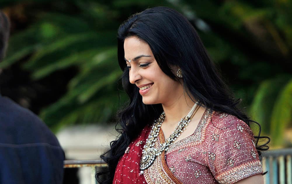 Bollywood actress Juhi Chawla, leaves the Carlton hotel prior to the wedding parade of Kunal Grover, son of London-based industrialists Kimi and Pamela Grover, in Cannes, southern France.