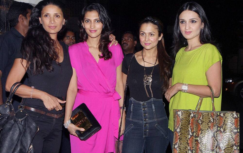 Arjun Rampal's wife and model Mehr Jesia Rampal, Dolly Sidhwani, Bollywood actresses Amrita Arora and Anu Dewan during a launch in Mumbai.