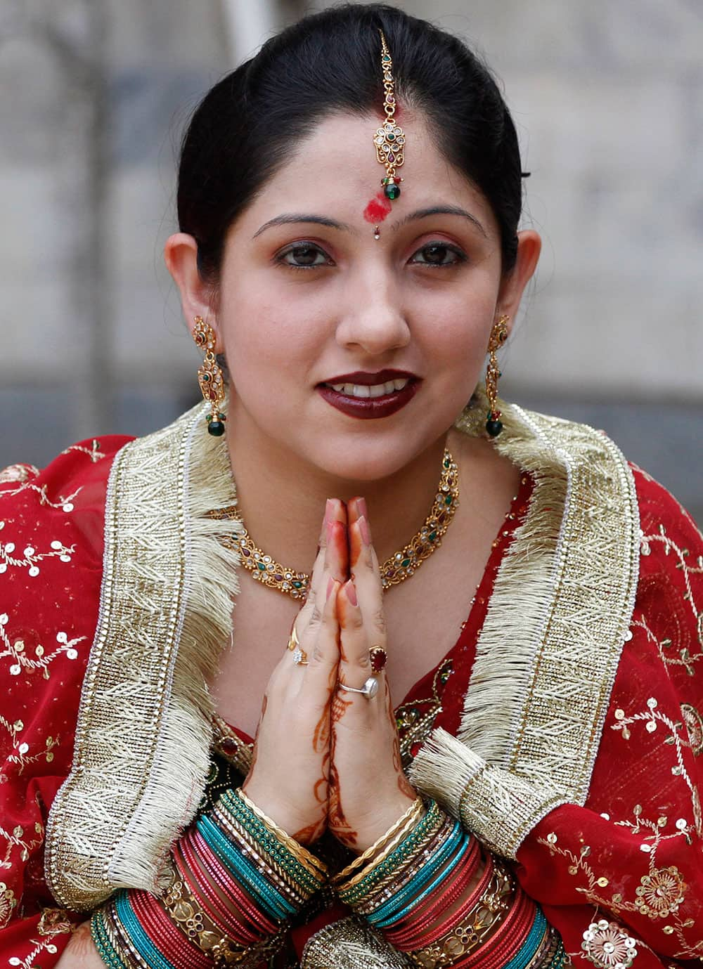 A married Hindu woman performs rituals on Karwa Chauth festival, in Allahabad.