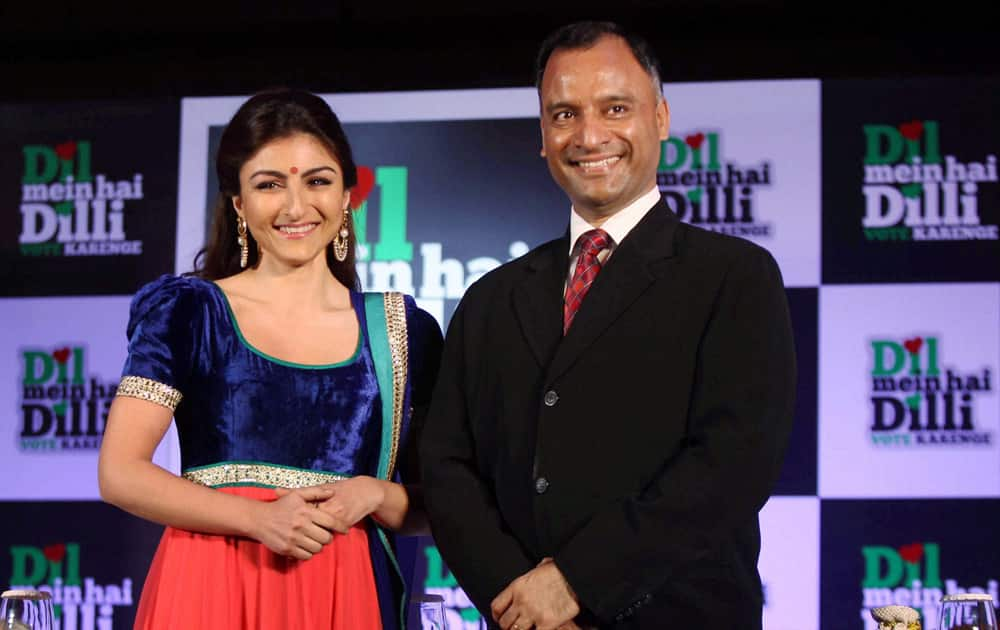 Chief Electoral Officer of Delhi, Vijay Dev with Bollywood actress Soha Ali Khan at the launch of an awareness campaign for Delhi assembly elections, in New Delhi.