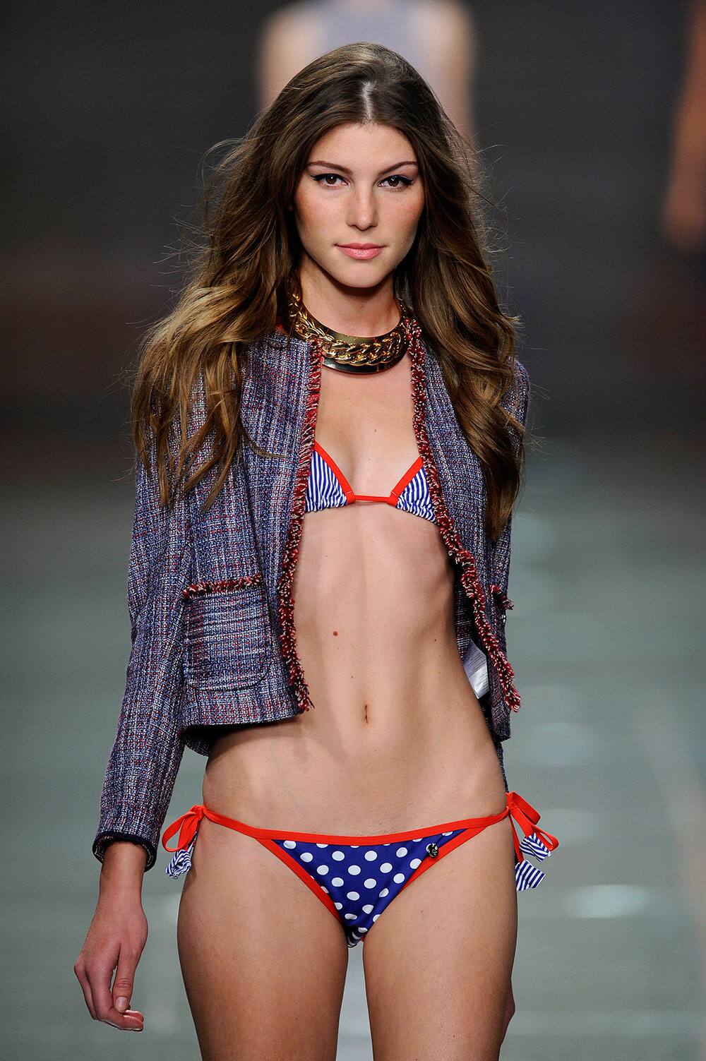 A model displays a creation by Portuguese designer Lions of Porches during the Portugal Fashion Spring/Summer 2014 week.