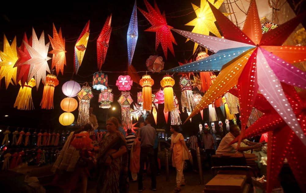 People buy lanterns from roadside stalls ahead of Hindu festival of lights Diwali, in Mumbai.