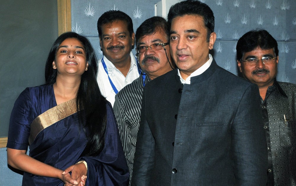 Southern superstar Kamal Haasan with Kannada actress & MP Ramya at a FICCI event in Bengaluru.