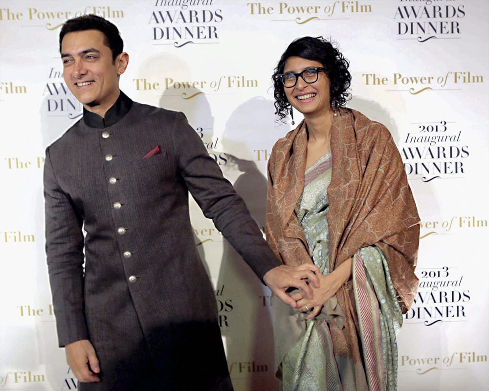 Aamir Khan and his wife Kiran Rao at America Abroad Media's 2013 Inaugural Awards Gala Dinner in Washington.