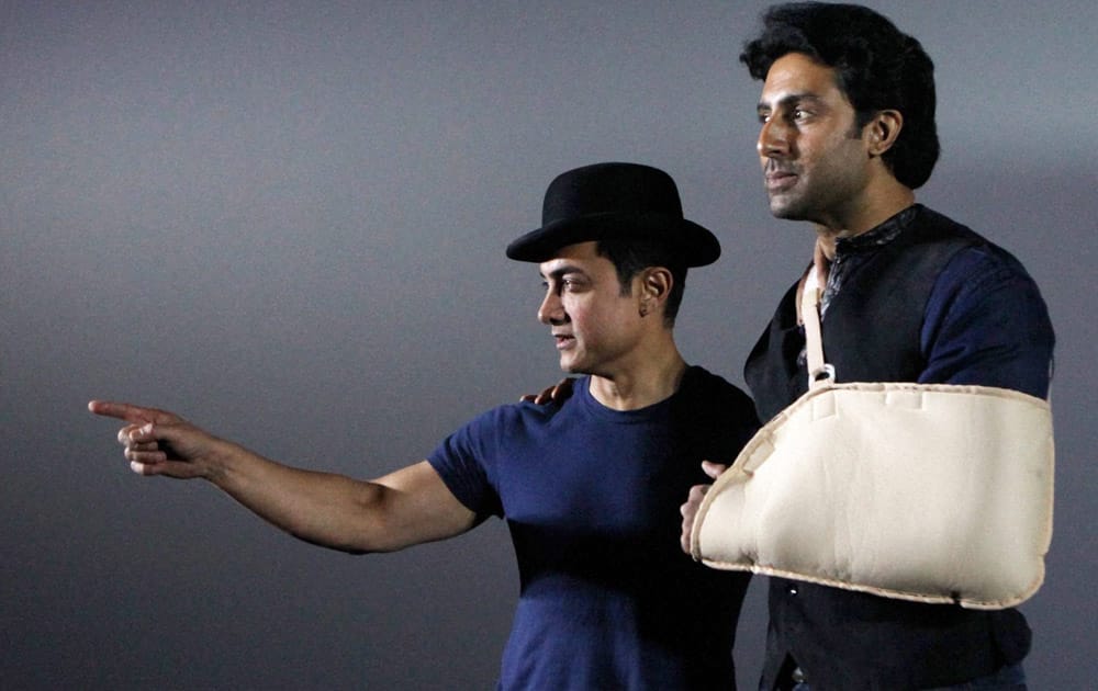 Aamir Khan with Abhishek Bachchan during the Dhoom: 3 promotions in Mumbai.