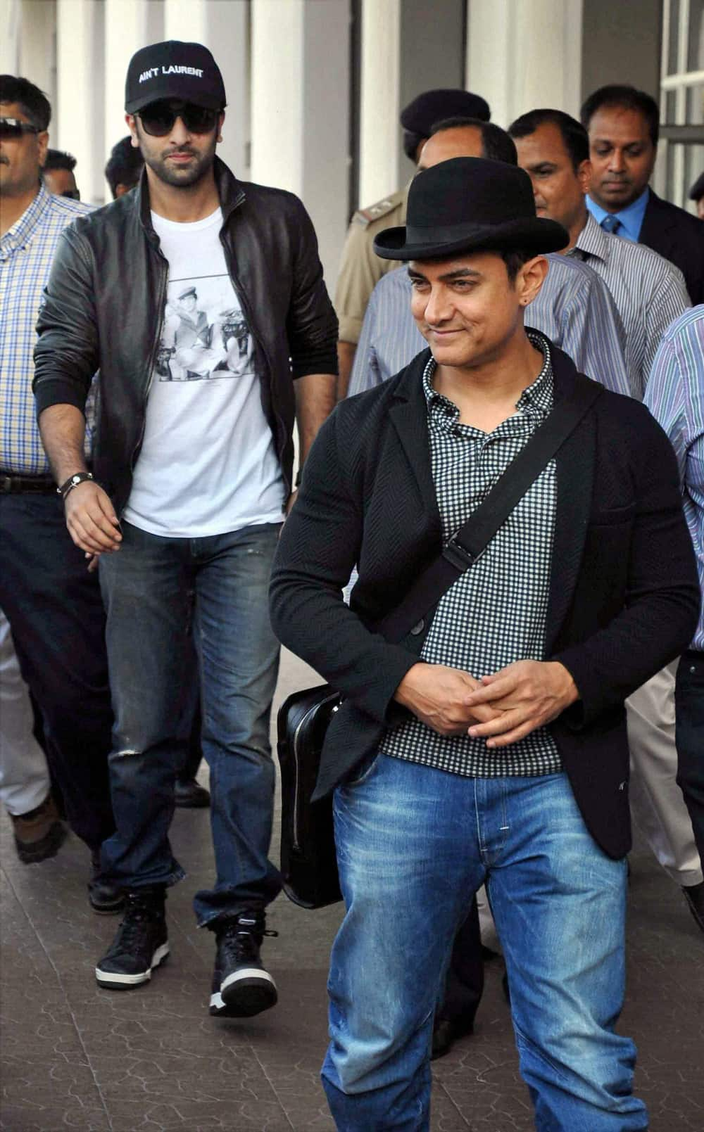 Aamir Khan and Ranbir Kapoor arrive at the airport in Jodhpur on Thursday to attend Nita Ambani's 50 birthday bash. 