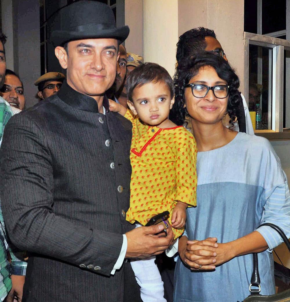 Actor Aamir Khan with his wife Kiran Rao and their kid leaves after attending Nita Ambani's 50th birthday party in Jodhpur.