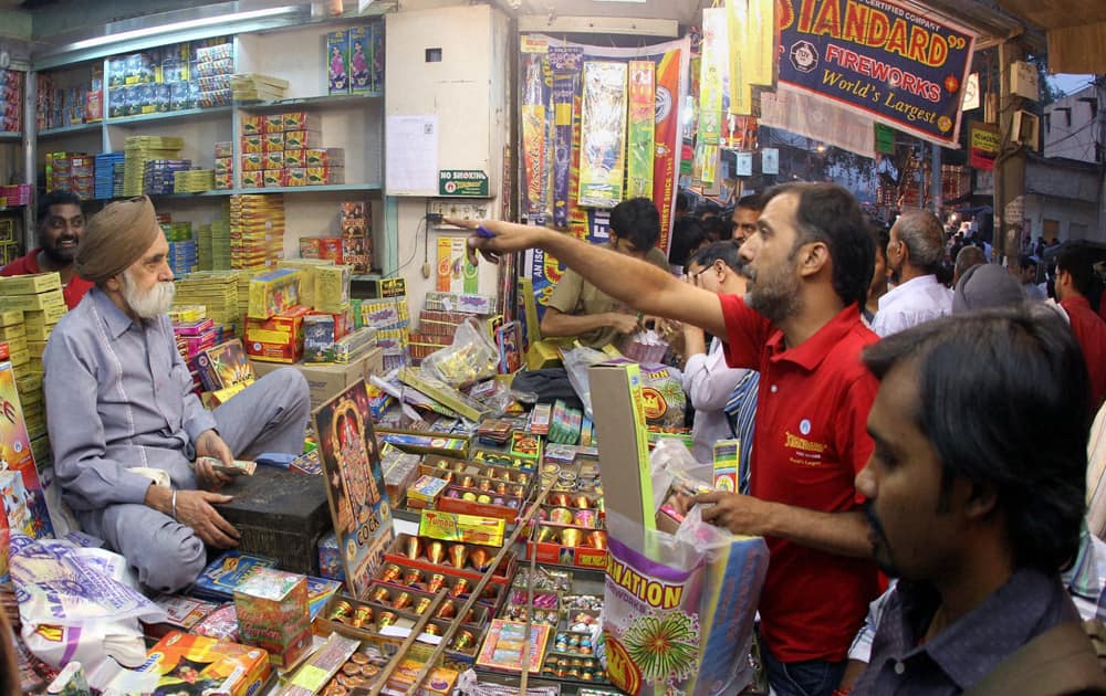 People busy buying crackers for Diwali festival in New Delhi.