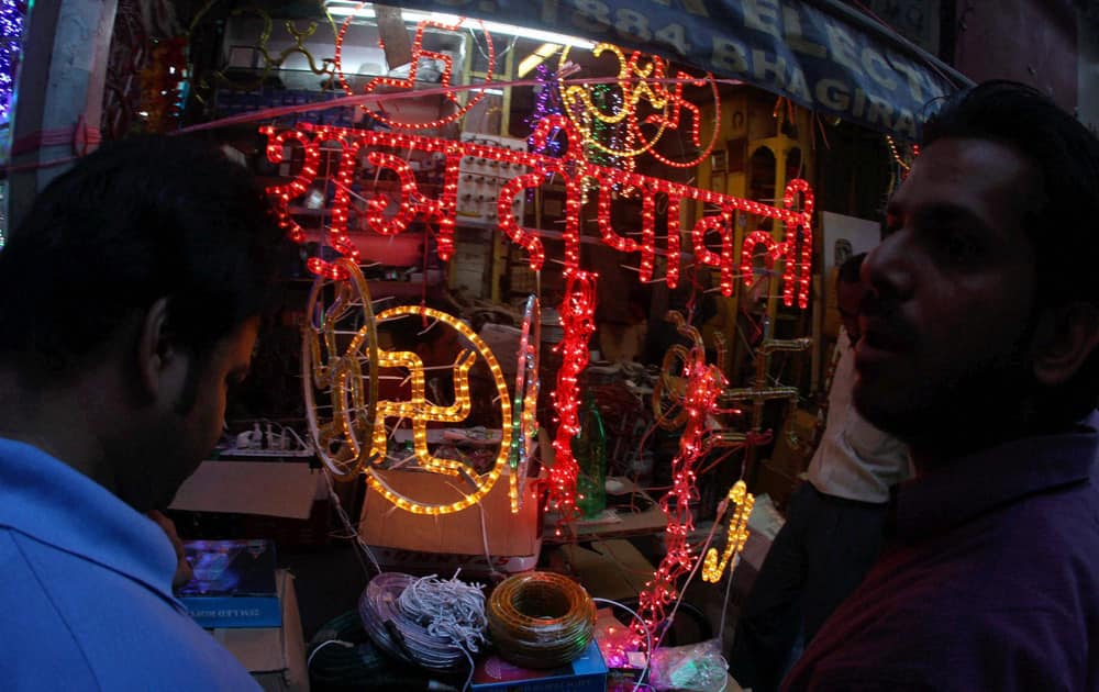 People busy buying lights for Diwali festival in New Delhi.