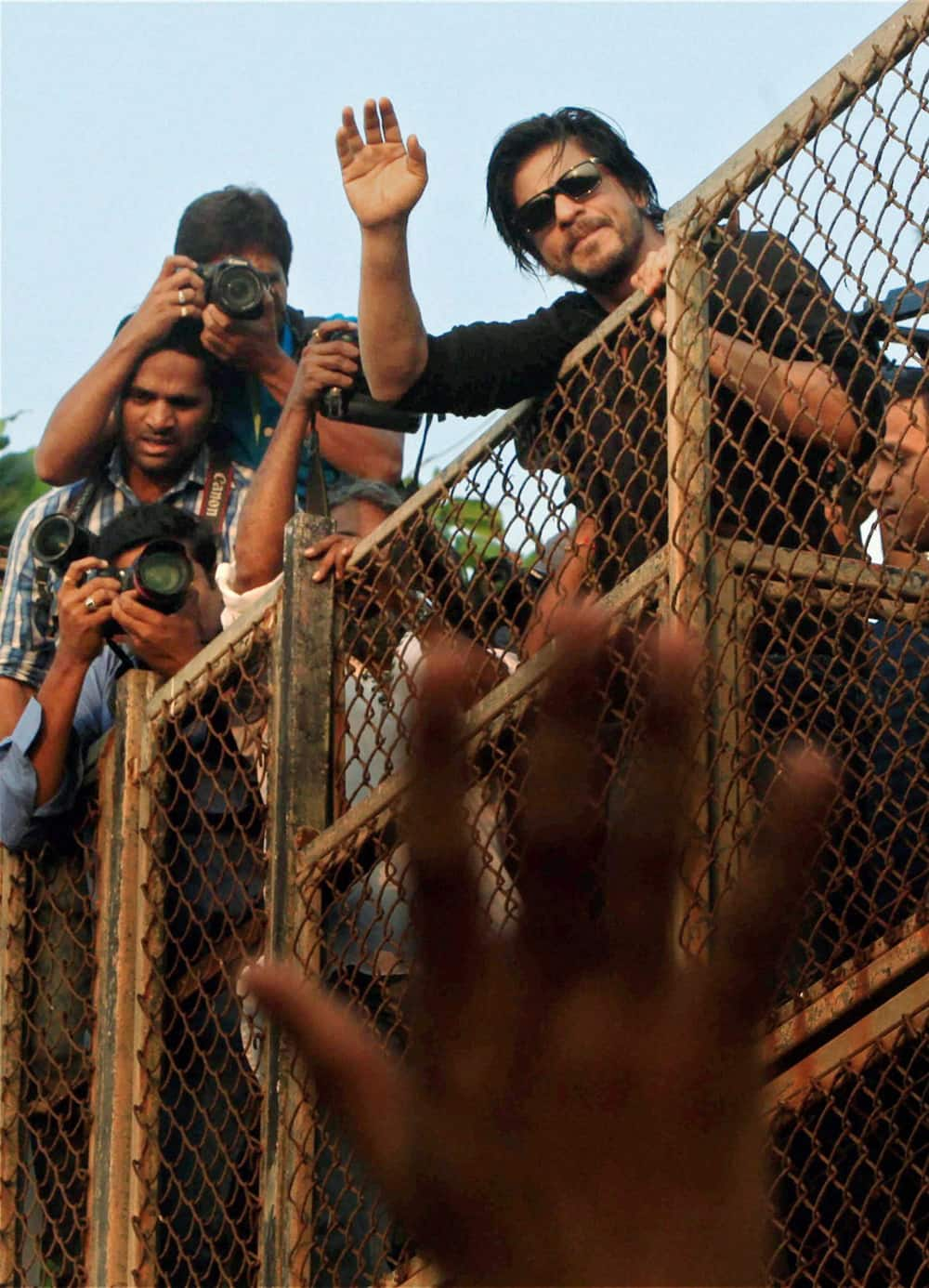 Shahrukh Khan waves to his fans on his birthday in Mumbai.