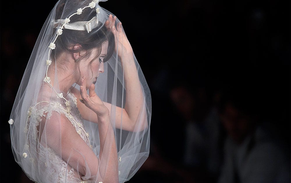 A model wears a creation from Samuel Cirnansck winter collection during the Sao Paulo Fashion Week.