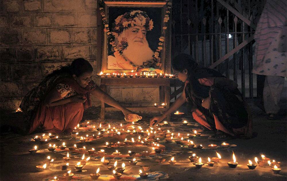 Supporters of Asaram Bapu celebrate Diwali Festival at out side Central Jail in Jodhpur.