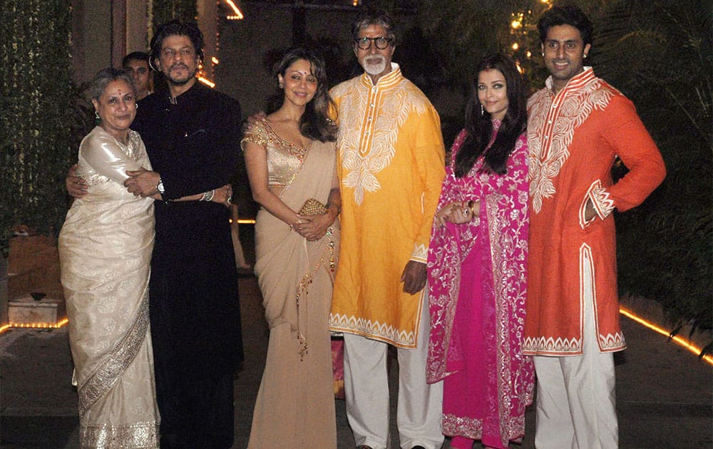 Bollywood actors Shah Rukh Khan with Jaya Bachchan, wife Gauri Khan, Amitabh Bachchan, Aishwarya and Abhishek Bachchan at a Diwali party in Mumbai.