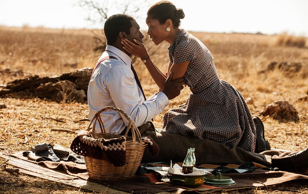 This image shows Idris Elba, as Nelson Mandela, left, and Naomie Harris as Winnie Mandela in a scene from 