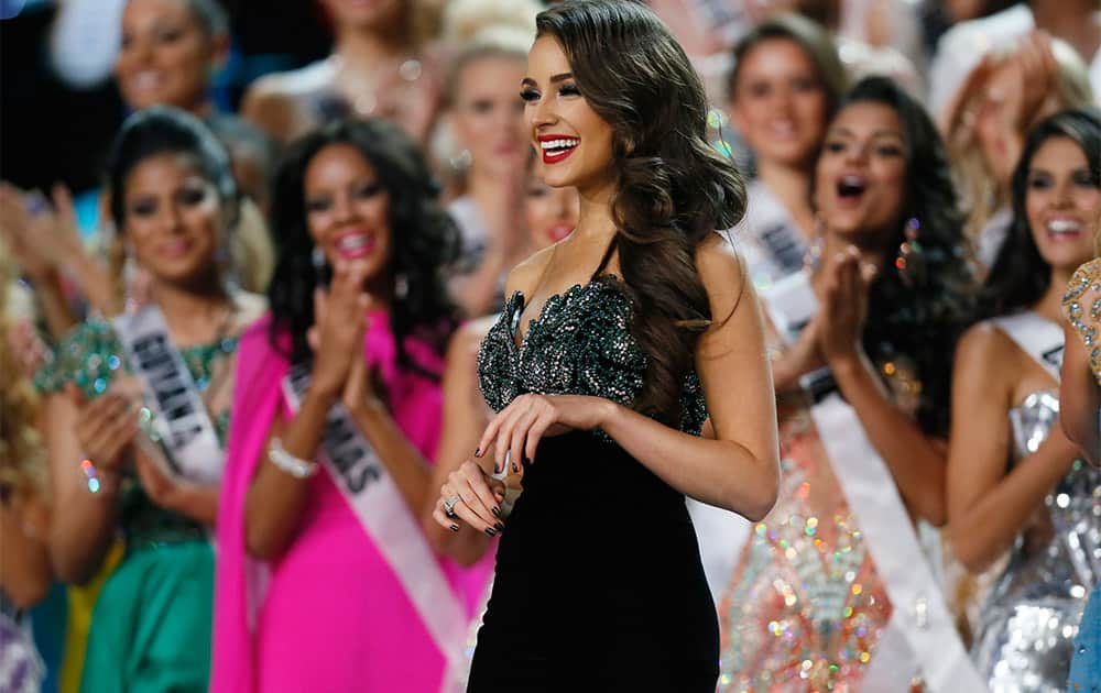 Miss USA 2012 and Miss Universe 2012 Olivia Culpo taken a group picture with participants of Miss Universe 2013 during the preliminary competition of the 2013 Miss Universe pageant in Moscow, Russia.