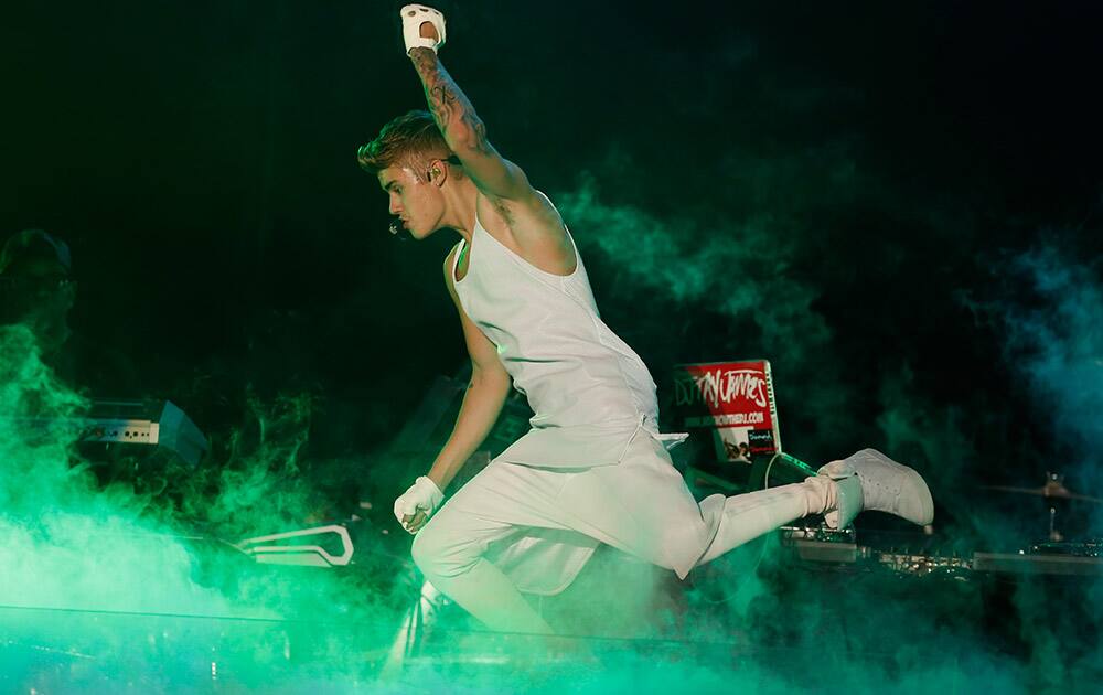 Canada's pop star Justin Bieber performs in concert during his Believe world tour in Asuncion, Paraguay.