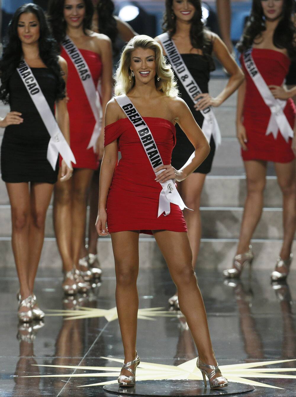 Miss Great Britain Amy Willerton smiles while competing in the 2013 Miss Universe pageant in Moscow.