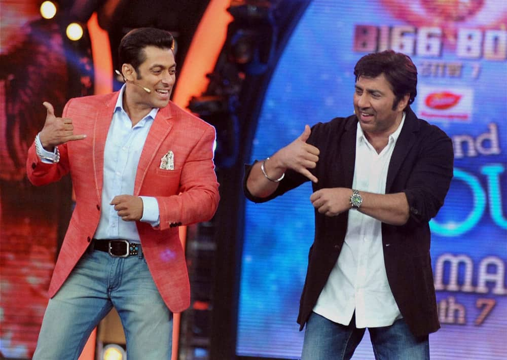 Bollywood actors Salman Khan with Sunny Deol during the promotion of his forthcoming Hindi Film ‘Singh Saab The Great’ on the set of Colors ‘Bigg Boss 7’ TV Reality Show in Lonavala.