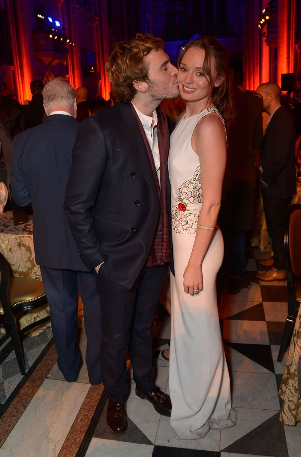 Sam Claflin and wife Laura Haddock attend the 'The Hunger Games: Catching Fire' Premiere After-Party,  in the Royal Court of Justice, London. 'Catching Fire' is the second instalment in 'The Hunger Games' trilogy. 