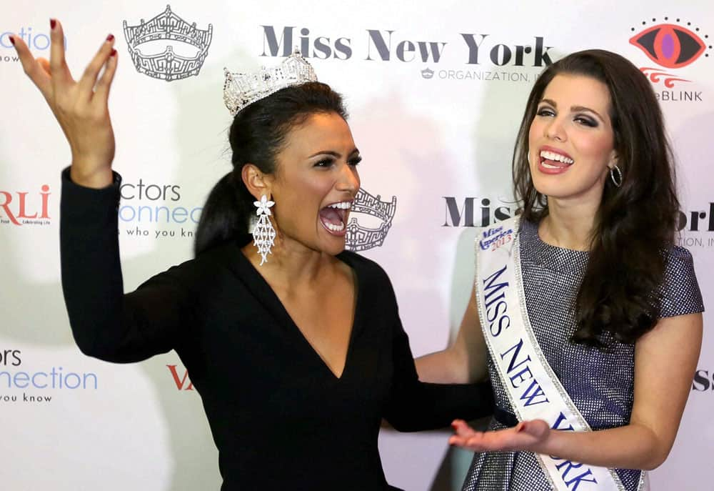 Miss America 2013 Nina Davuluri and Amanda Mason Miss New York 2013 celebrating crowning ceremony of Miss New York 2013 in New York.