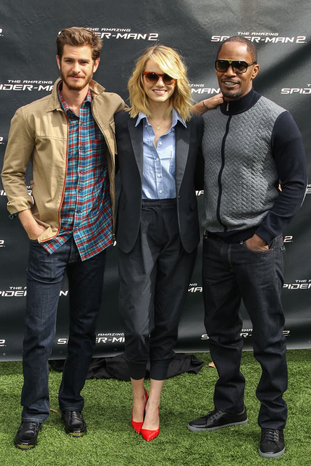 Actors Andrew Garfield, Emma Stone and Jamie Foxx attend a photo call for The Amazing Spider-Man 2 at Sony Studios.