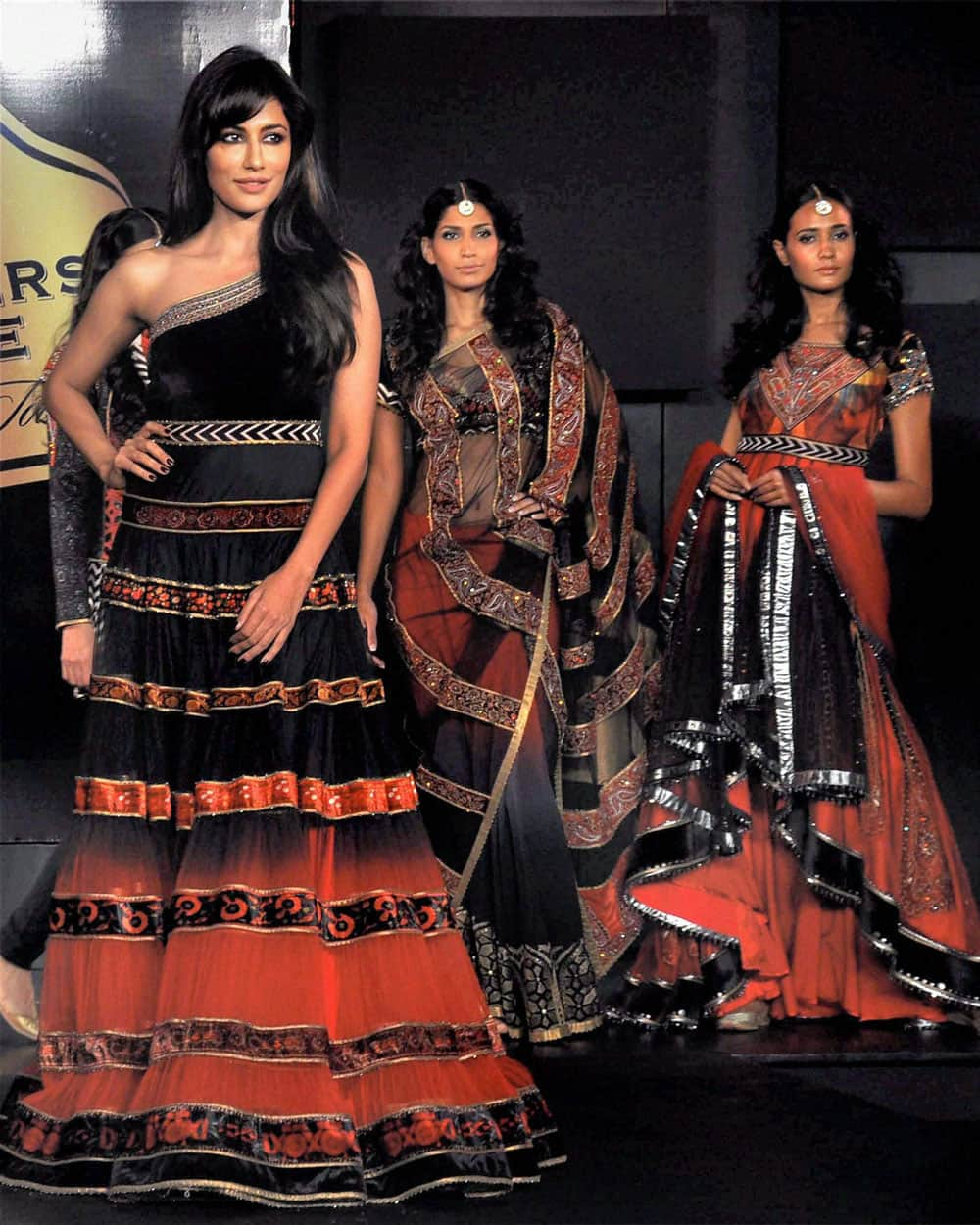 Bollywood actress Chitrangada Singh walks on the ramp with other models during a fashion show in Gurgaon.