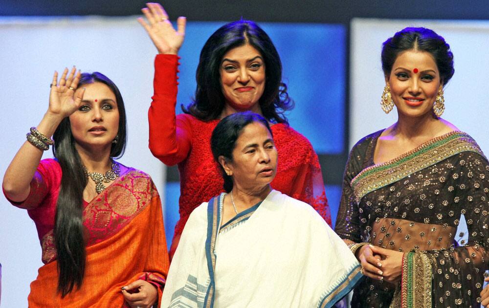 West Bengal Chief Minister Mamata Banerjee with Bollywood actresses Bipasha Basu, Rani Mukherjee and Sushmita Sen during closing ceremony of 19th Kolkata International Film Festival in Kolkata.