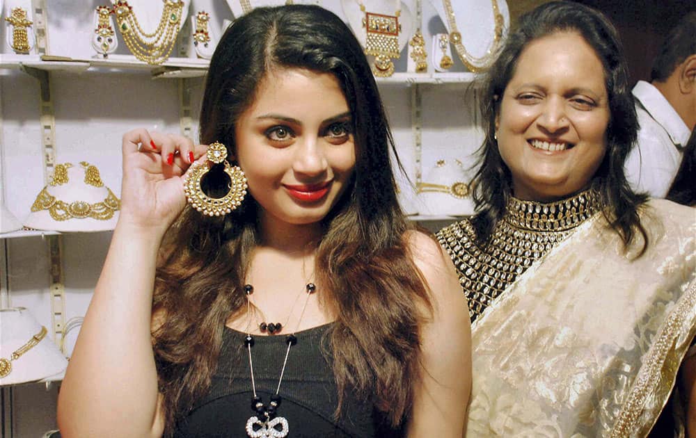 Actress Suhani and Anita Agarwal Chief Organizer Desire designer Exhibition during the inauguration of an event in Hyderabad.