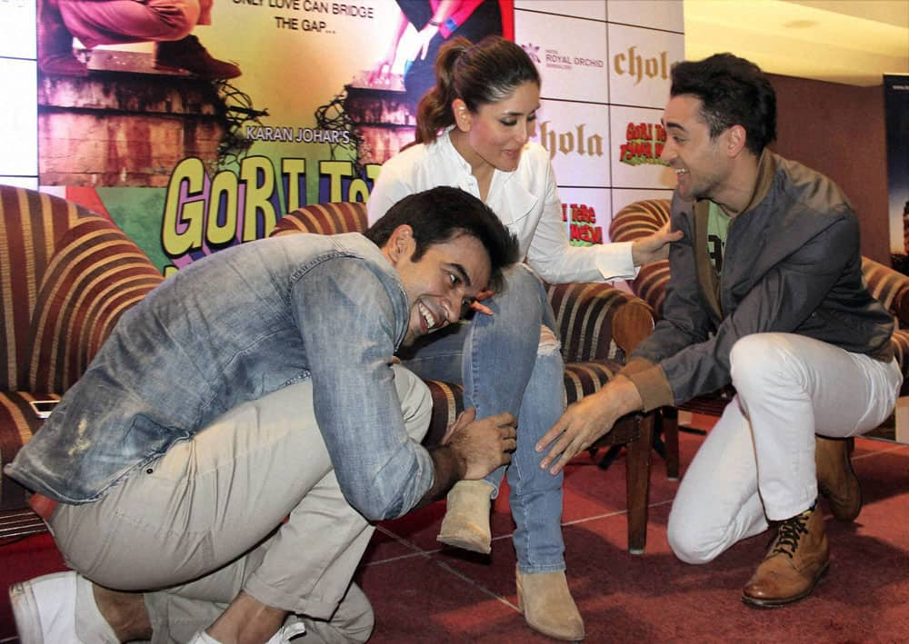 Bollywood Director Punit Malhotra with actors Imran Khan and Kareen Kapoor at a promotional event of their upcoming film 'Gori Tere Pyar Mein' in Bengaluru.