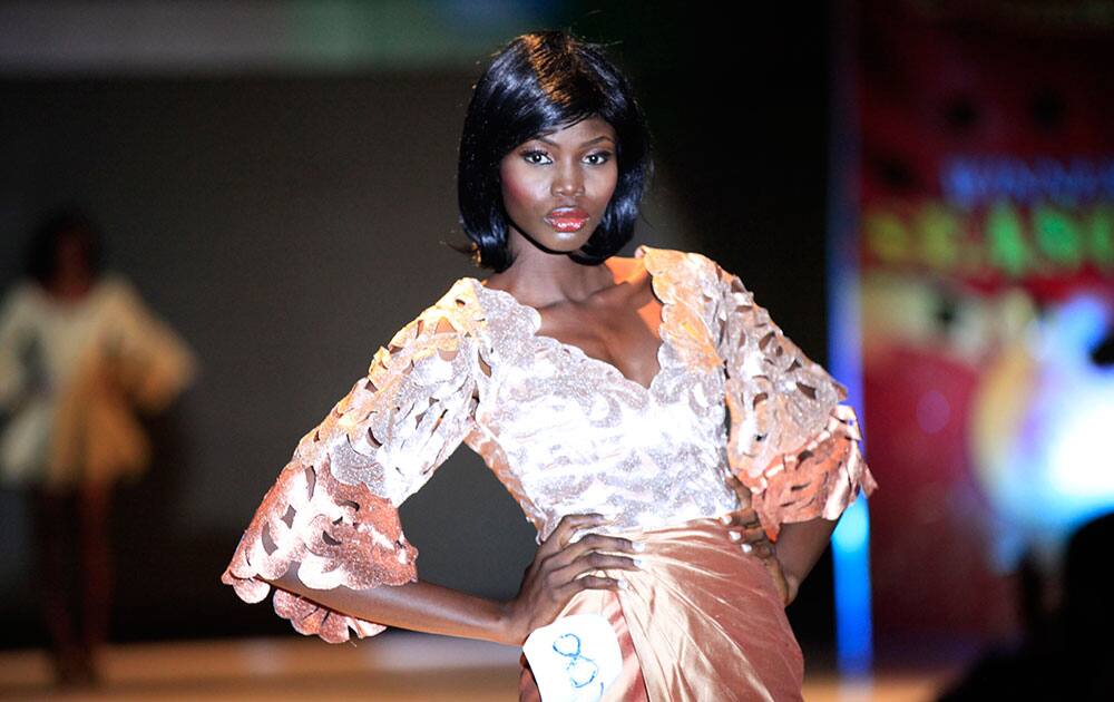 A model display an outfit by designer Deola Sagoe during Nigeria's Next Top Supermodel competition.