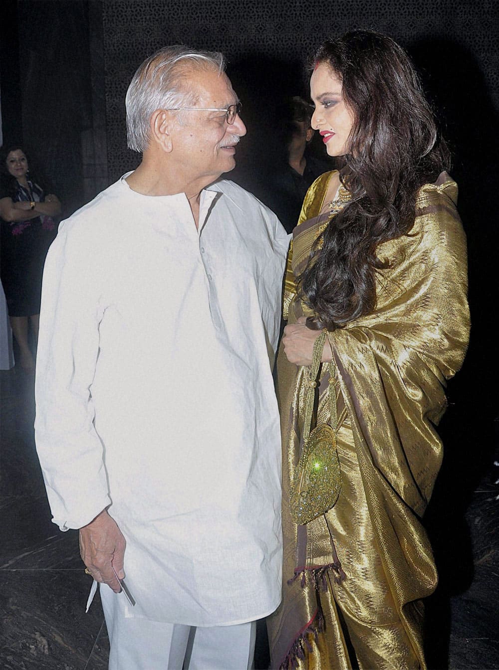 Bollywood lyricist Gulzar with actress Rekha during an awards function in Mumbai.