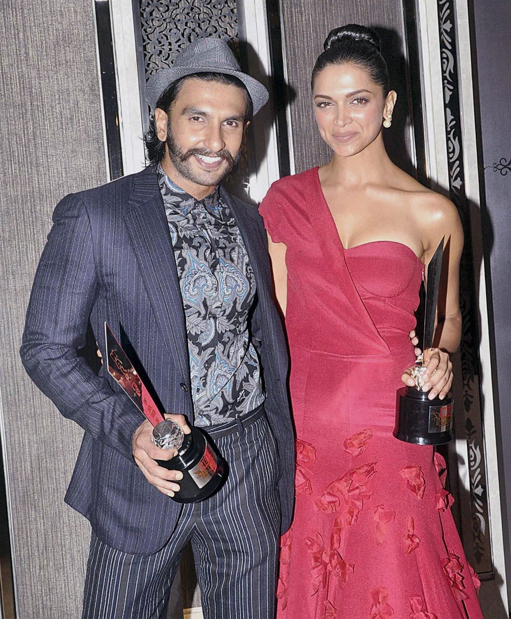 Bollywood actors Ranveer Singh and Deepika Padukone during an awards function in Mumbai.