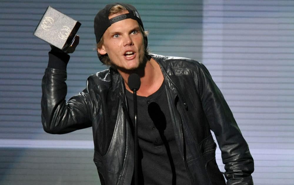 Avicii accepts the award for favorite artist - electronic dance music at the American Music Awards at the Nokia Theatre L.A. 