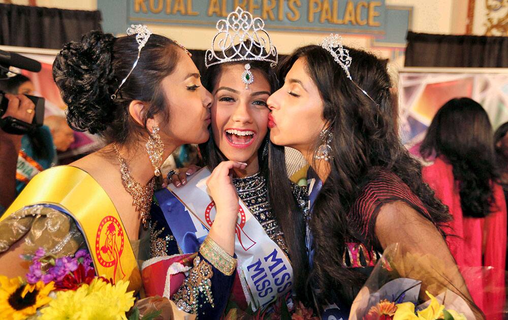 Monica Gill crowned Miss India USA 2013 by outgoing Miss India USA 2012 Priyan Bhargava at a beauty pageant held in New Jersey.