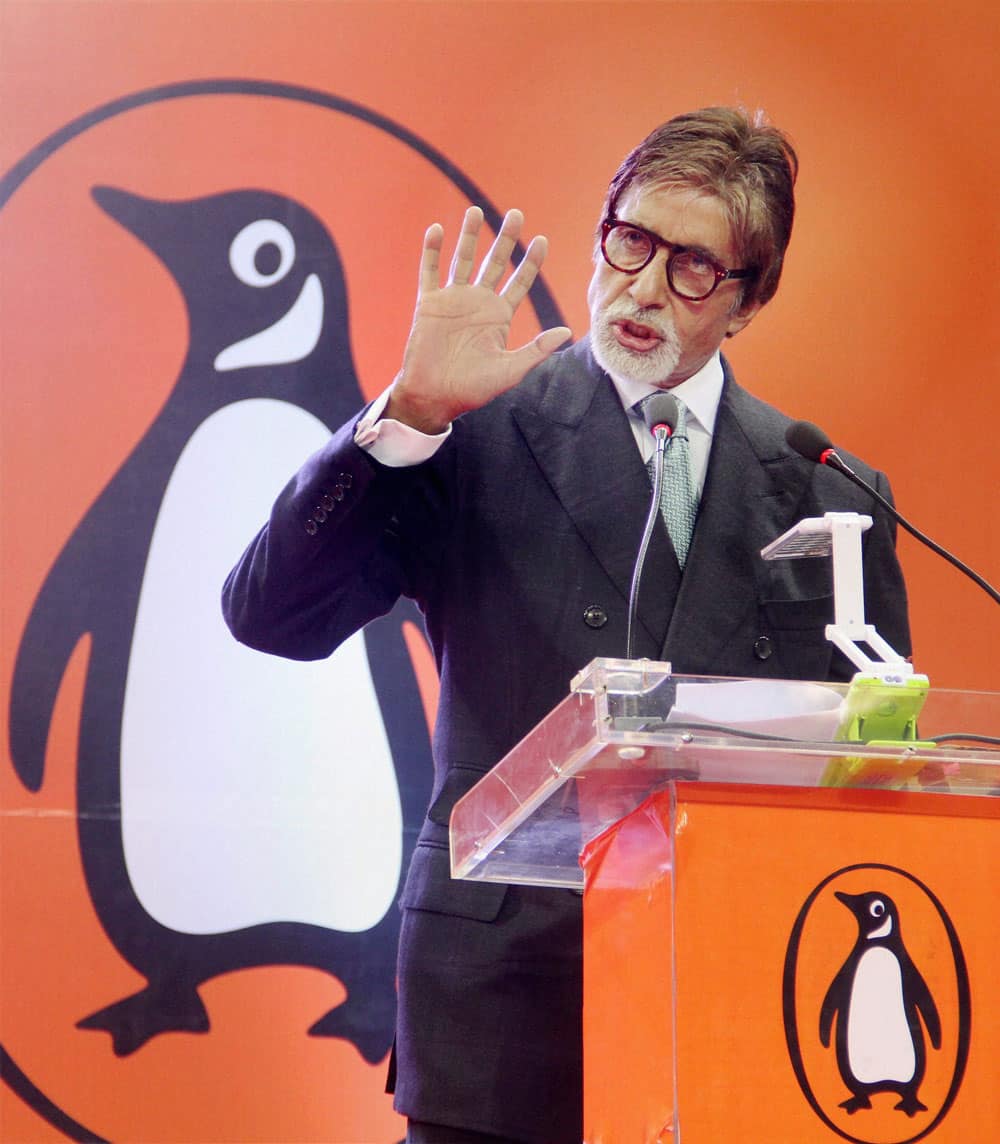 Bollywood actor Amitabh Bachchan gestures during an event in New Delhi.