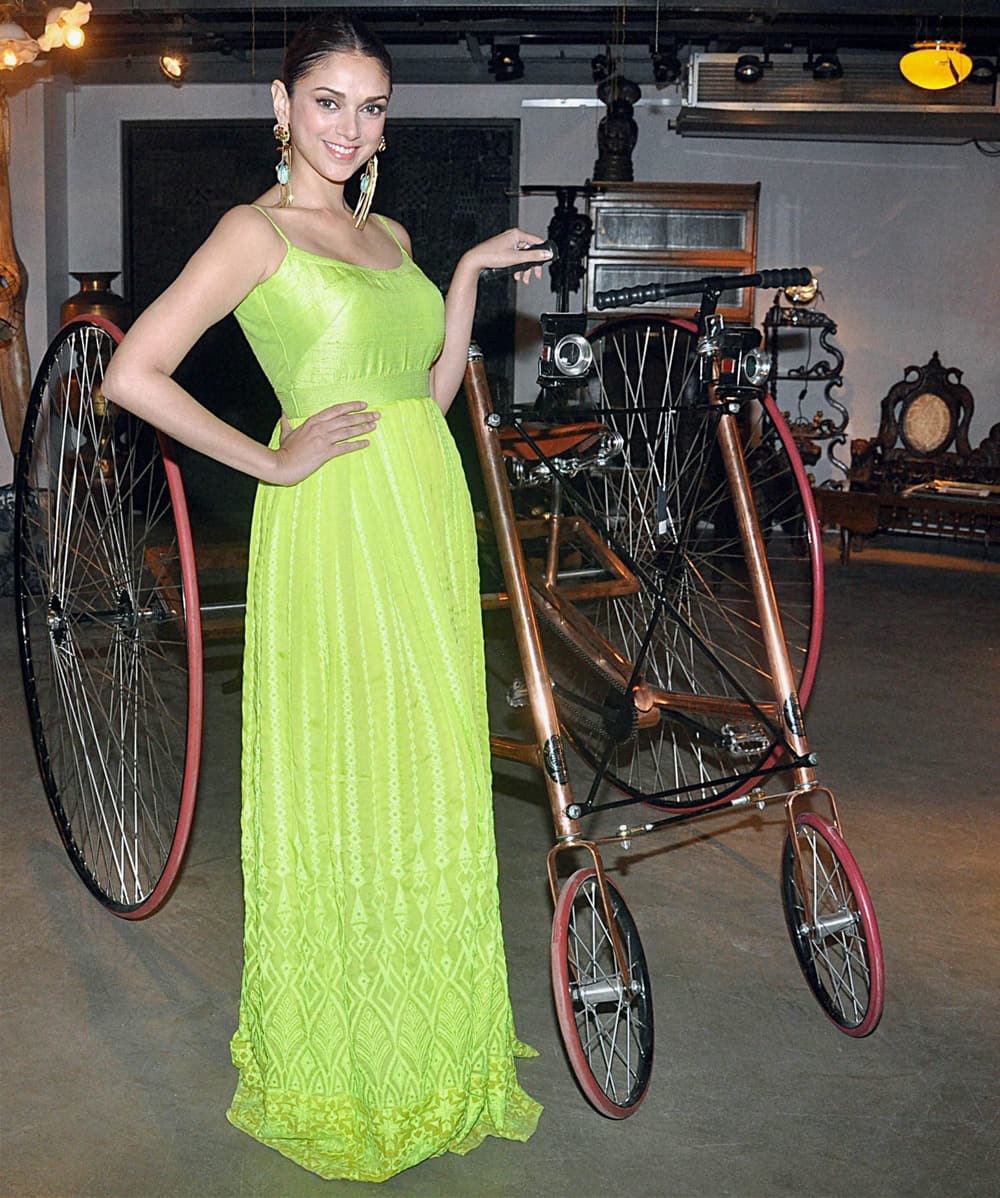 Aditi Rao Hyadri poses for the photographers during an event in Mumbai.