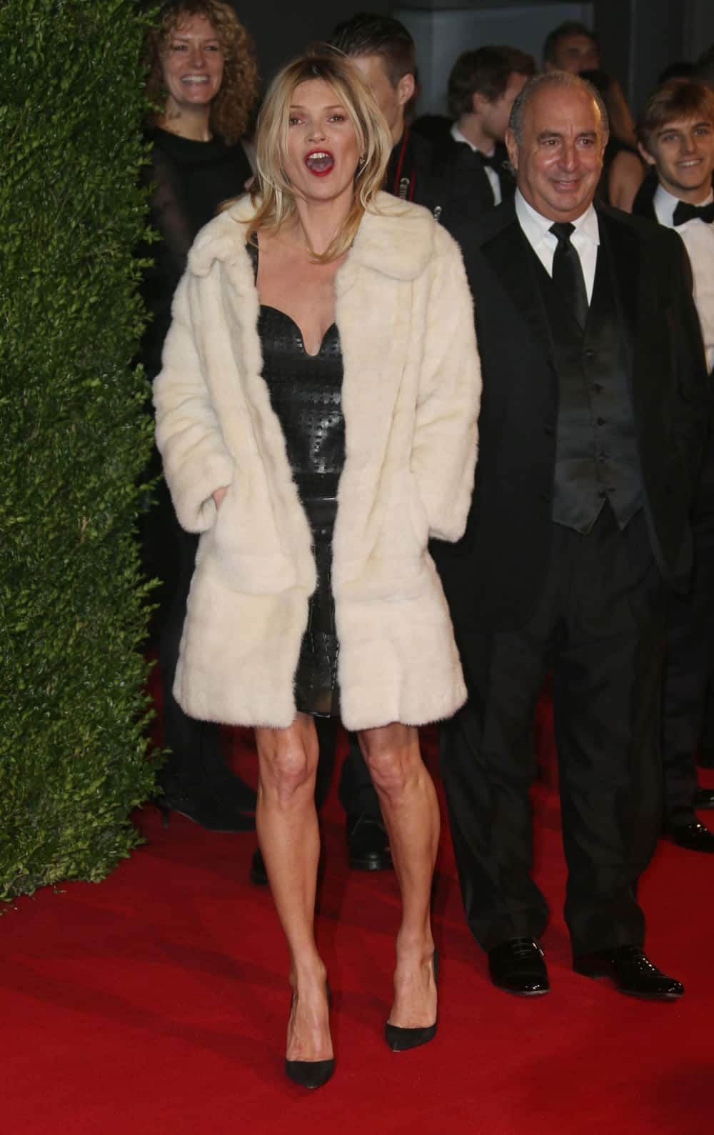 British model Kate Moss and Sir Philip Green arrive at the London Coliseum for the 2013 British Fashion Awards, in central London.